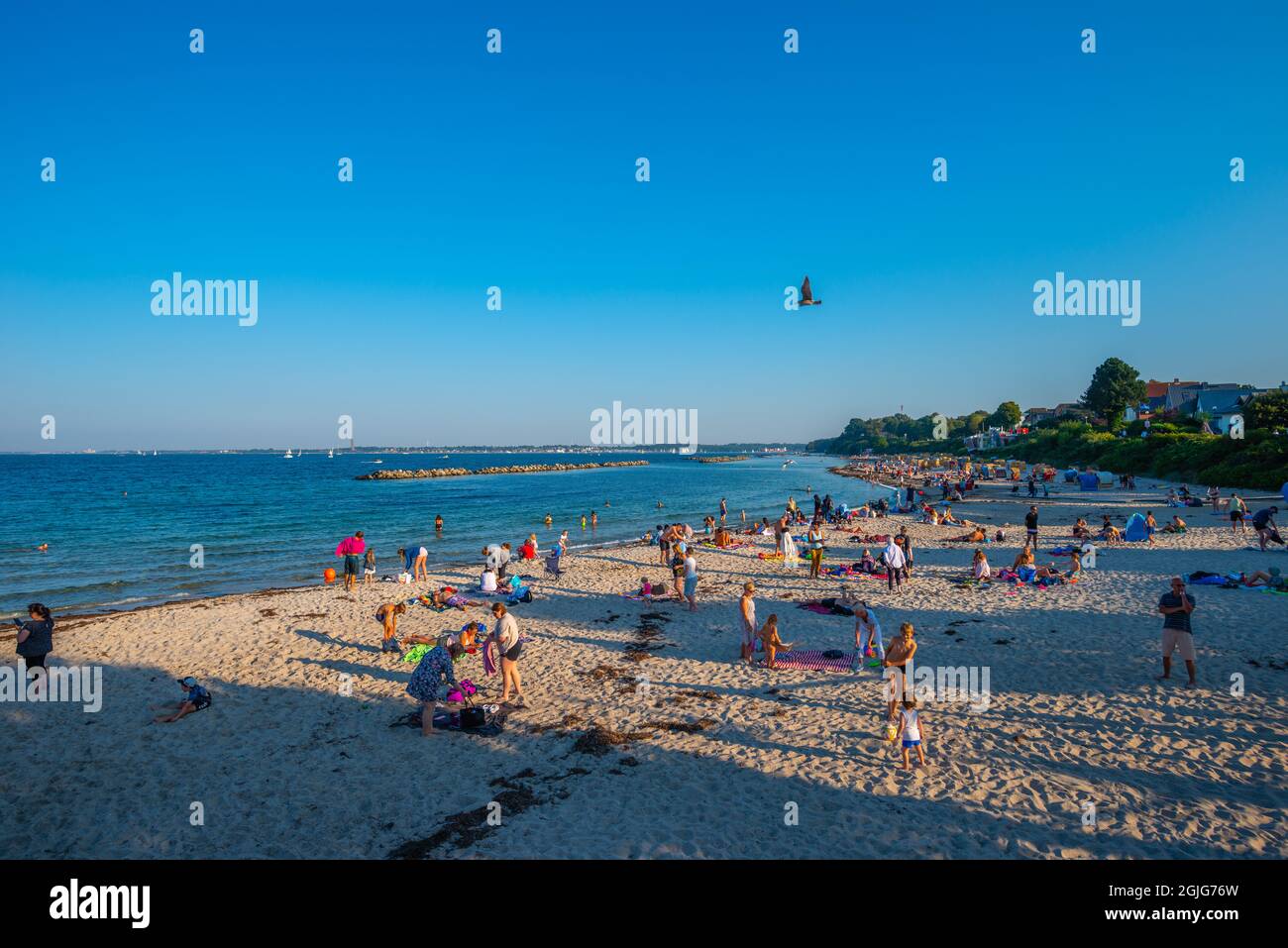 Sandy beach in Kiel-Schilksee on the Baltic Sea, people sunbathing and swimming, Kiel-Schilksee, Kiel, Schleswig-Holstein, Baltic Sea,  North Germany Stock Photo