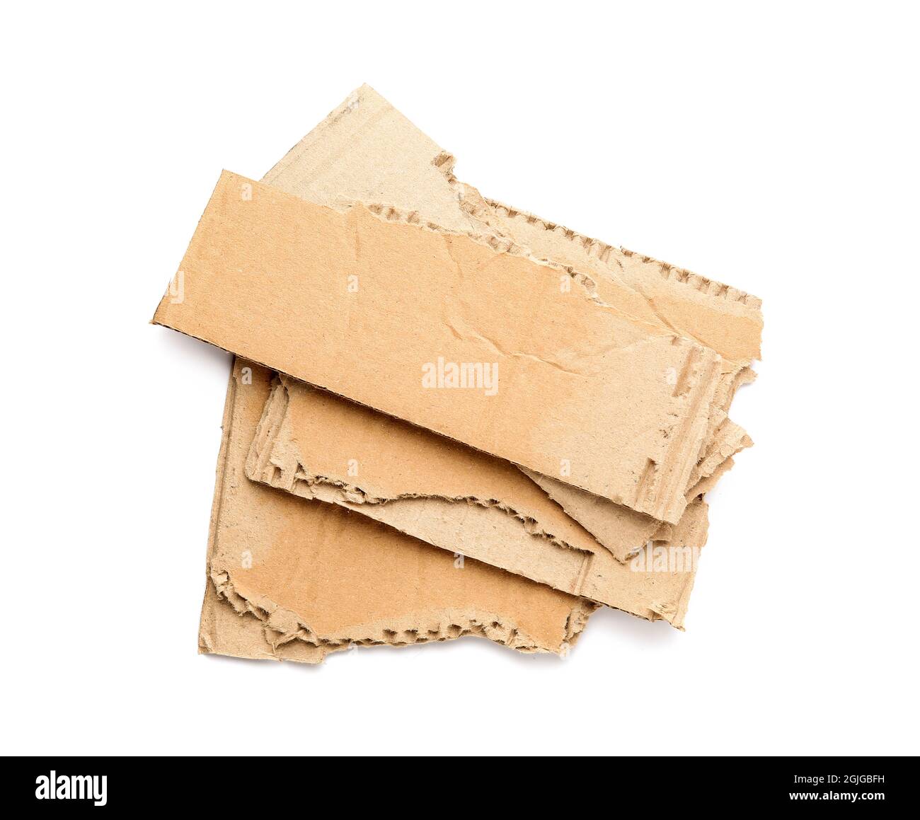 Pieces of cardboard on white background Stock Photo - Alamy
