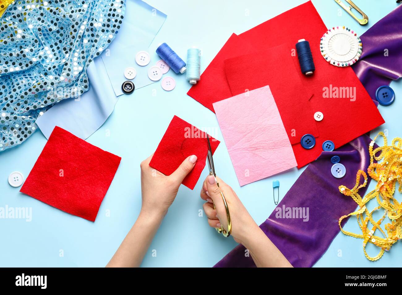 Woman cutting felt on hi-res stock photography and images - Alamy