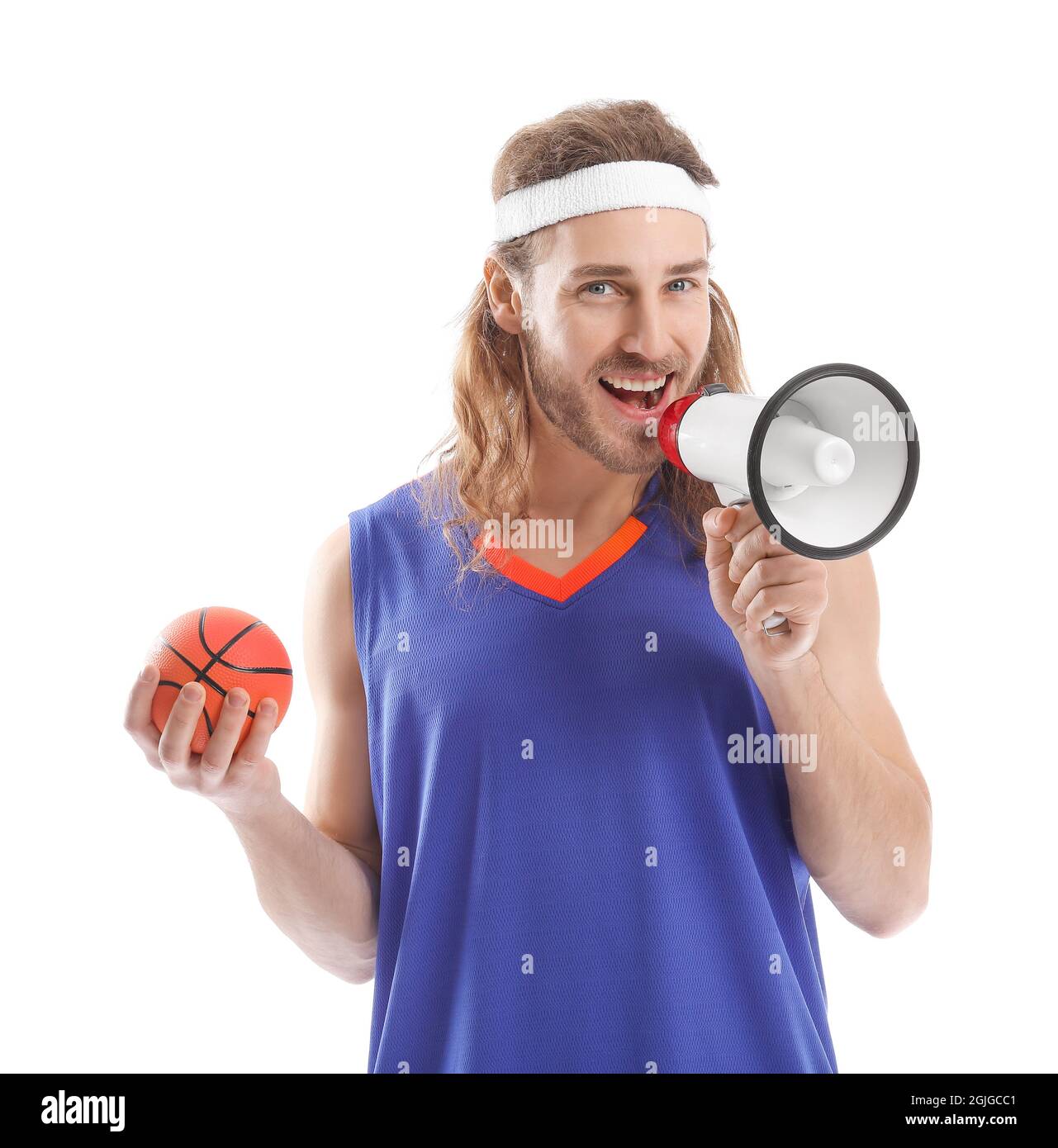 Male cheerleader with ball and megaphone on white background Stock