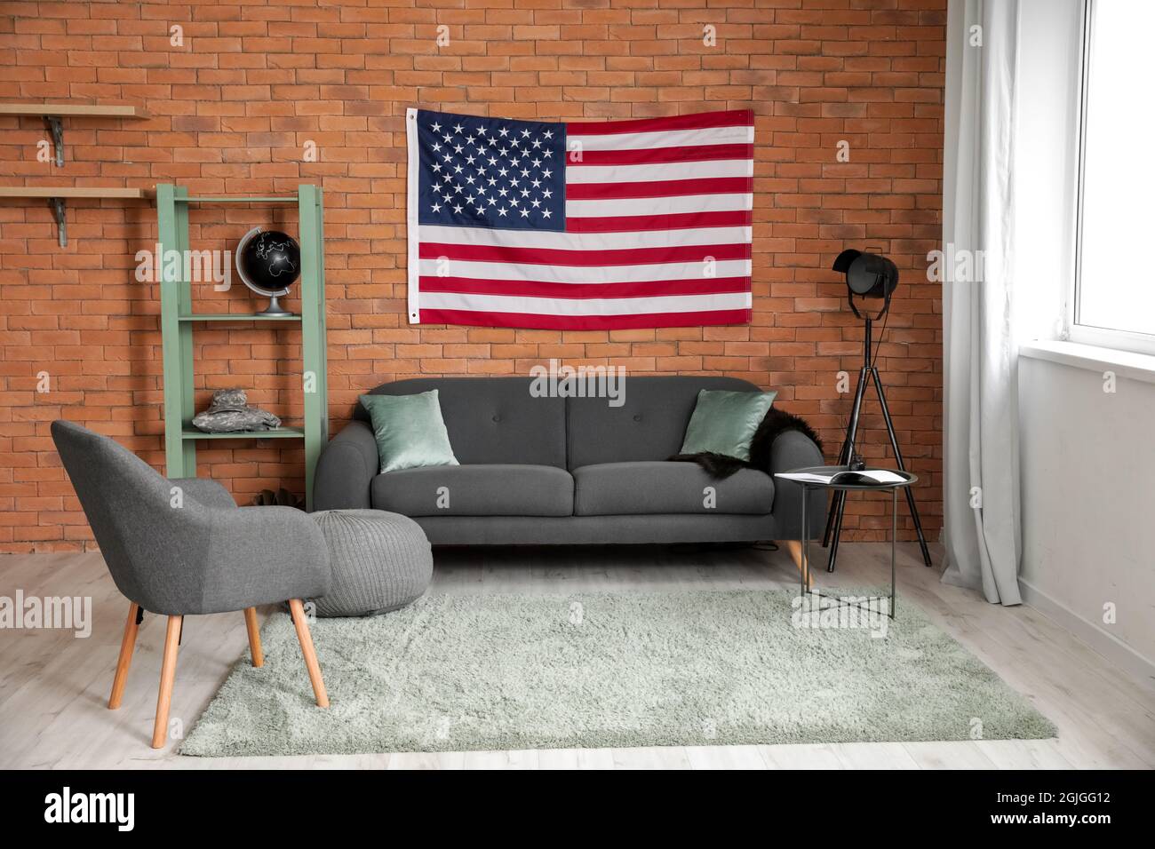 Interior of stylish living room with USA flag Stock Photo - Alamy