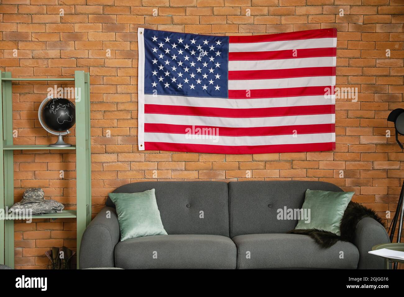 Interior of stylish living room with USA flag Stock Photo - Alamy