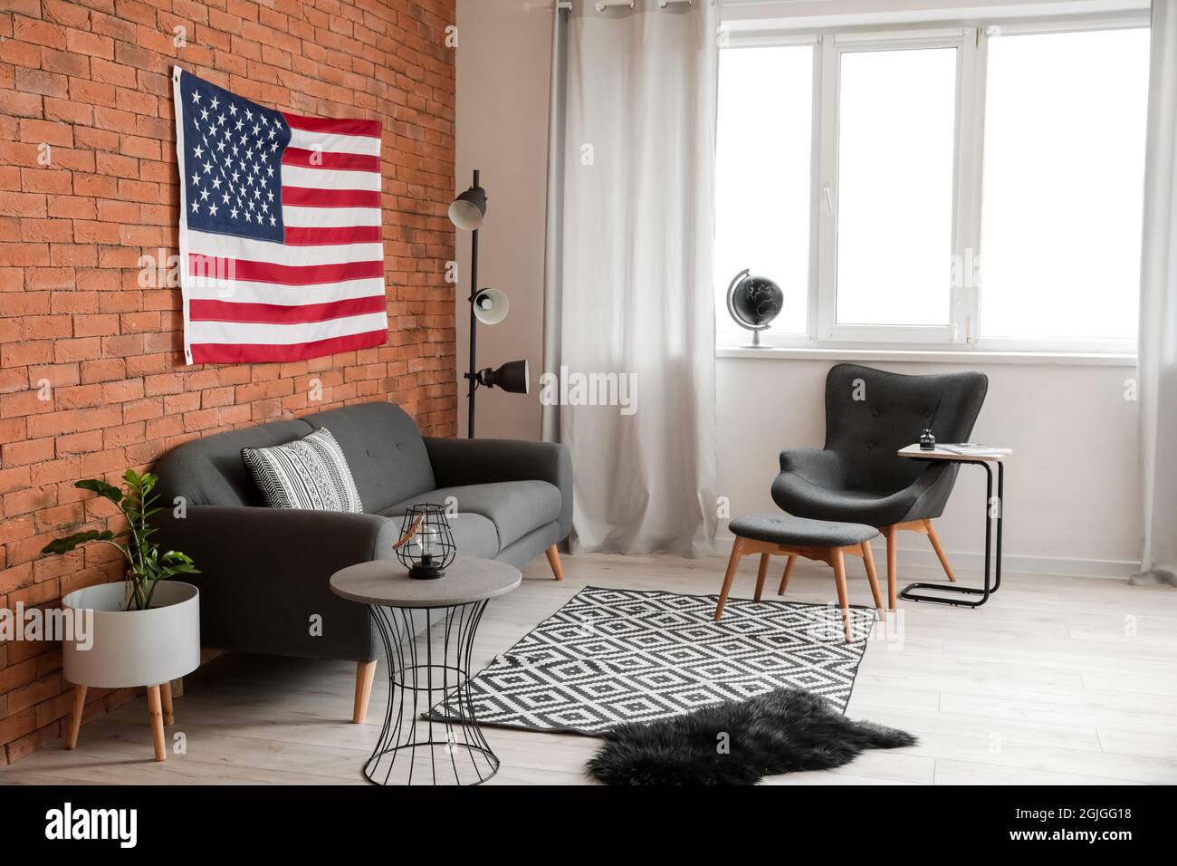 Interior of stylish living room with USA flag Stock Photo - Alamy