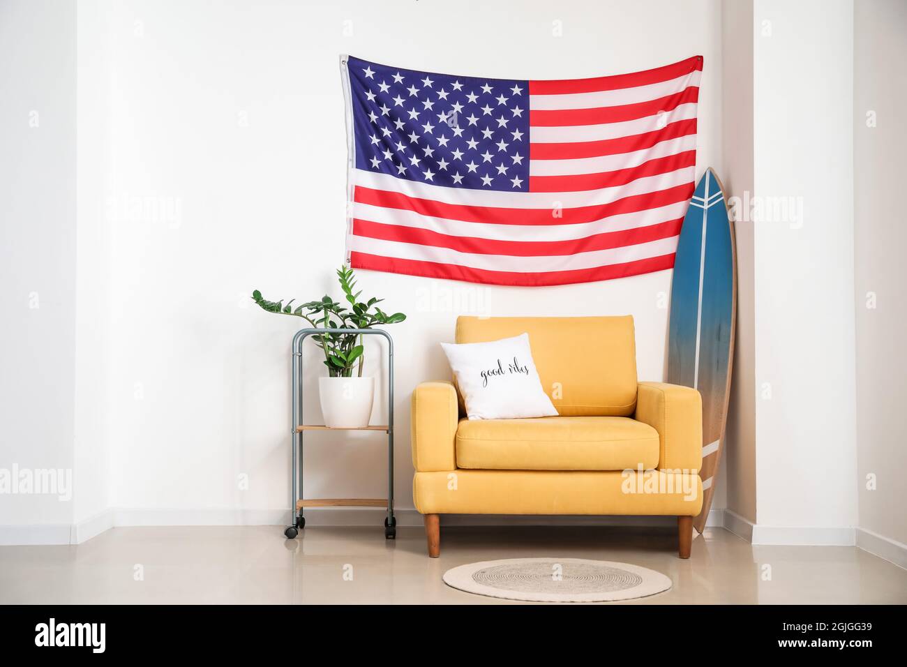 Interior of stylish living room with USA flag Stock Photo - Alamy