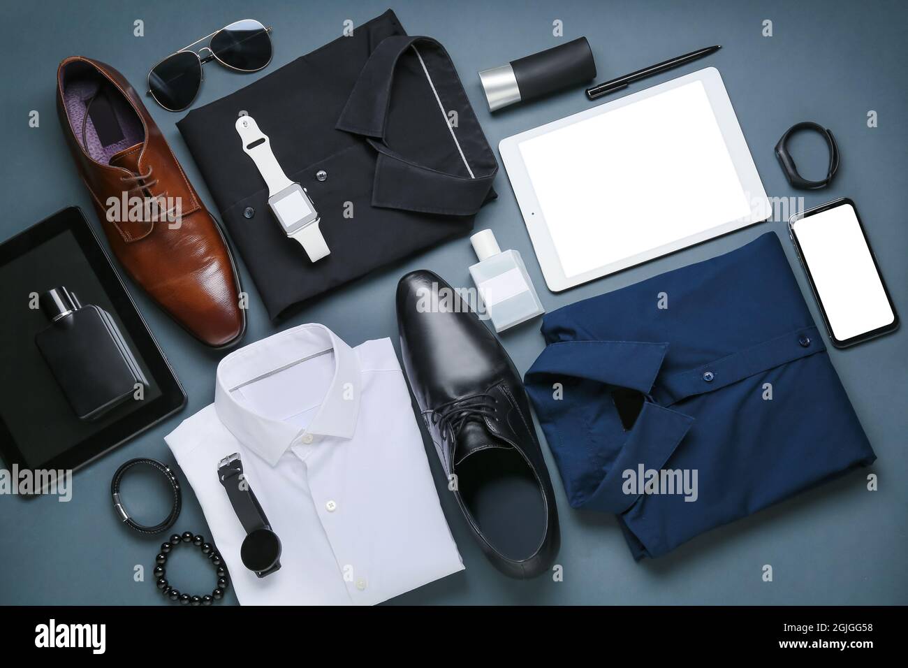 Stylish male clothes, gadgets and accessories on dark background Stock  Photo - Alamy