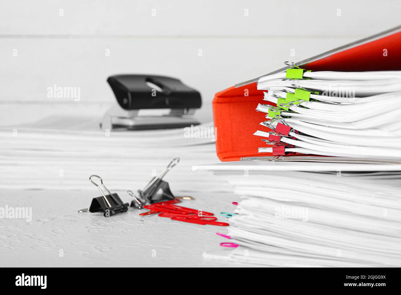 Stack of folders with documents on table Stock Photo