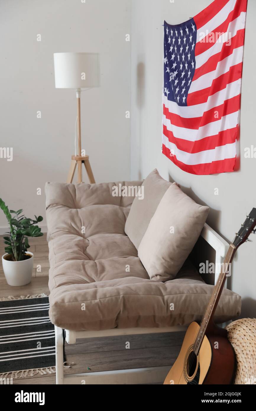 Interior of stylish living room with USA flag Stock Photo - Alamy