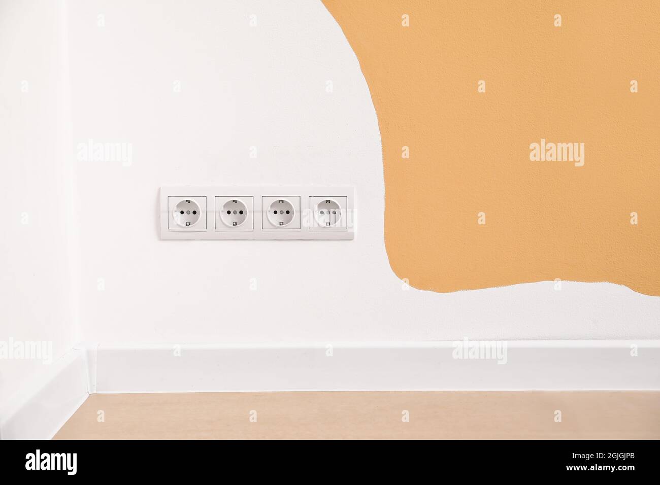 Orange wall power socket hi-res stock photography and images - Alamy