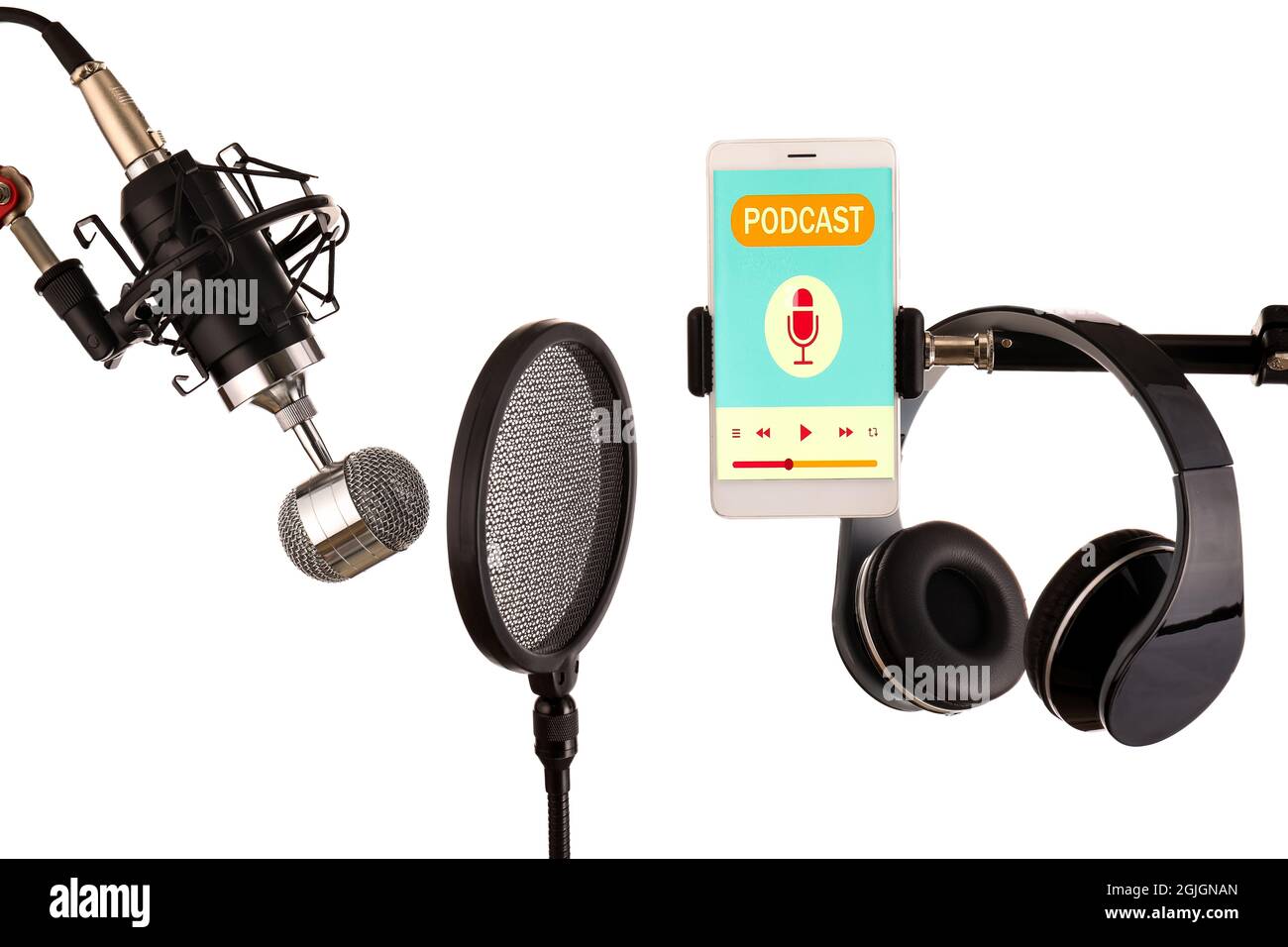 Modern microphone with pop filter, headphones and mobile phone on white  background Stock Photo - Alamy