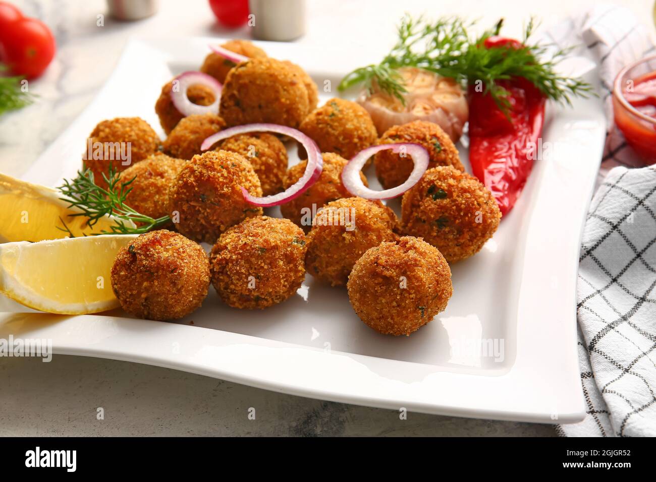 Cod Cutlets Plate with tasty cod cutlets on light background, closeup Stock Photo ...