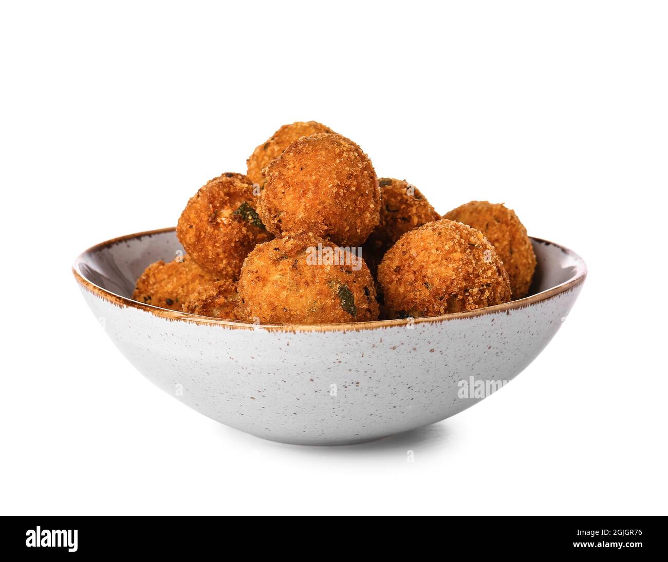 Bowl with tasty cod cutlets on white background Stock Photo