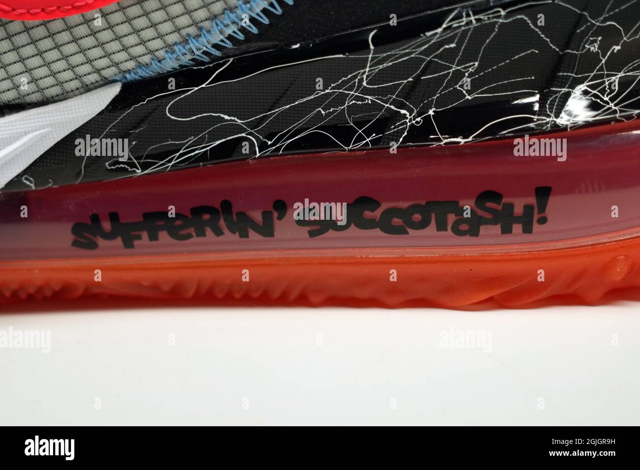 Detailed view of a 'Sufferin' succotash!' quote by Looney Tunes character Sylvester the Cat on the Air Max unit on a Nike LeBron 18 low limited editio Stock Photo