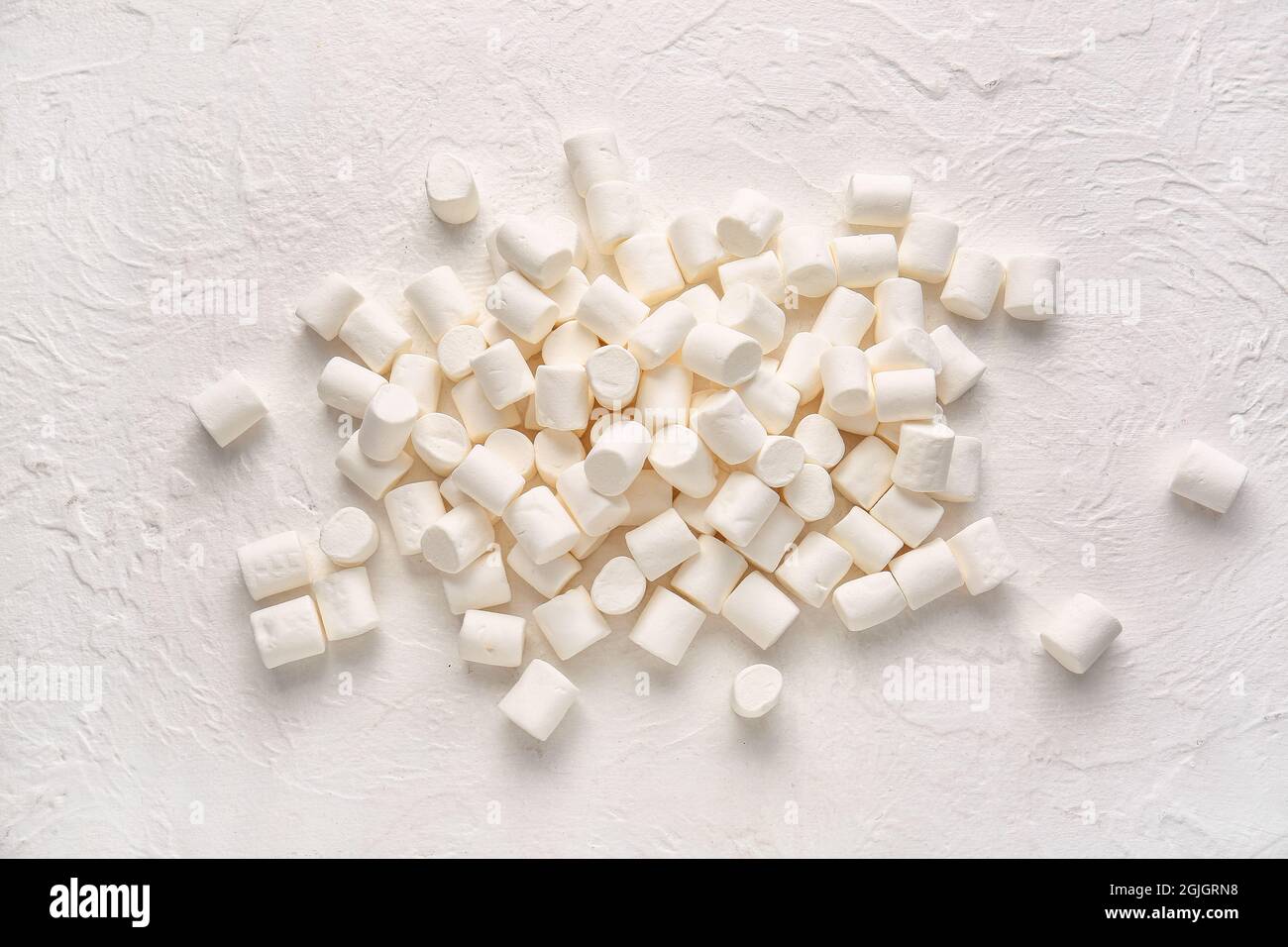 Heap of tasty marshmallows on light background Stock Photo - Alamy
