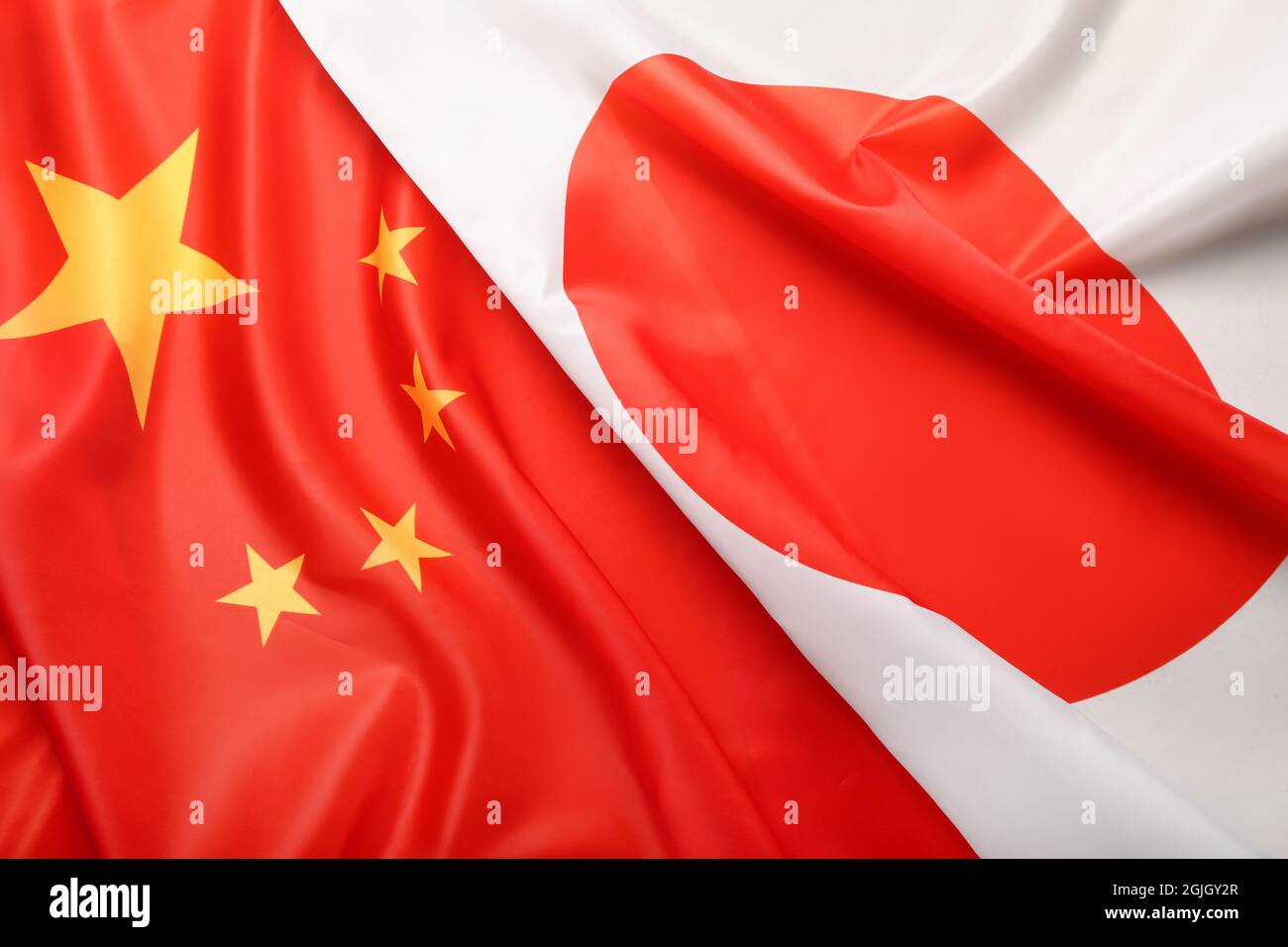 Flags of China and Japan as background Stock Photo Alamy
