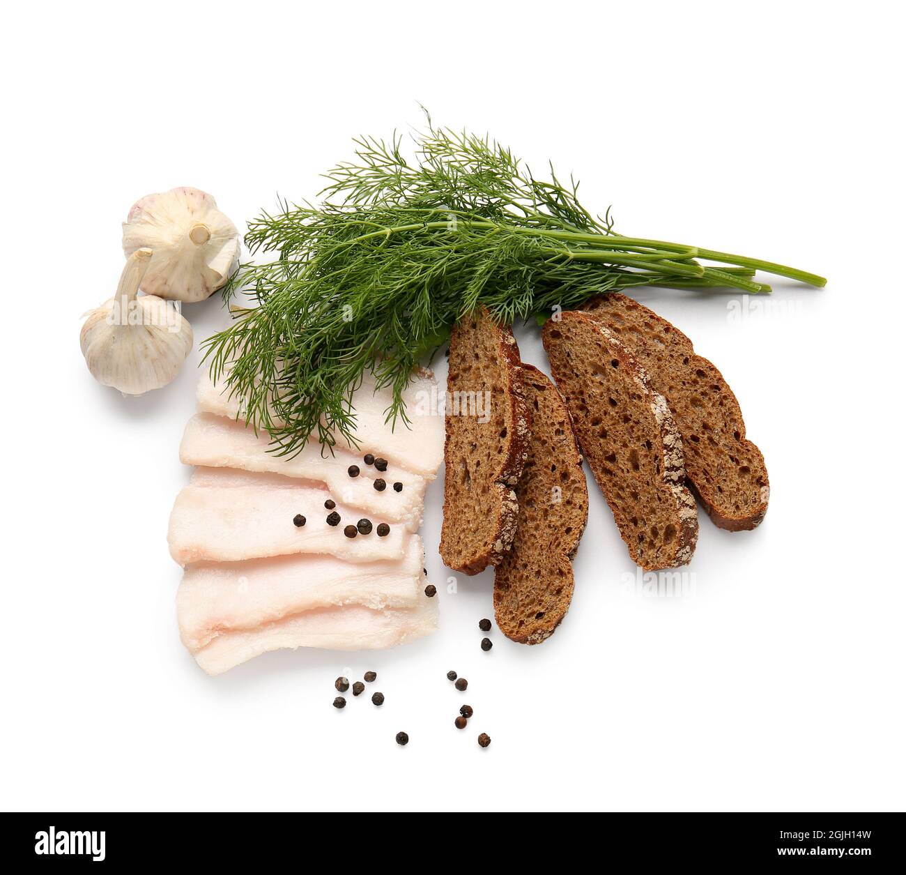 Slices of salted lard with garlic and bread on white background Stock