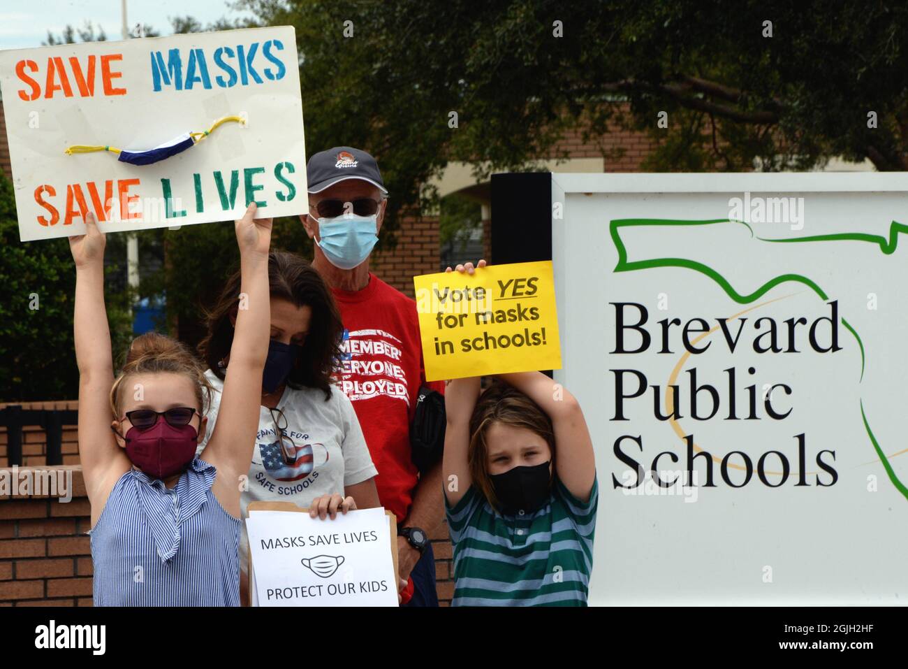 Viera. Brevard County. Florida. USA. September 9, 2021.Still not believing that Trump did not win the 2020 election a group of protesters assembled in front of the Brevard County School board building to burn face masks and wave flags. Other protesters in support of the board's decision for mandatory masks in the classroom assembled in the same area under the watchful eye of a Brevard County Sheriffs Deputy. Photo Credit: Julian Leek/Alamy Live News Stock Photo
