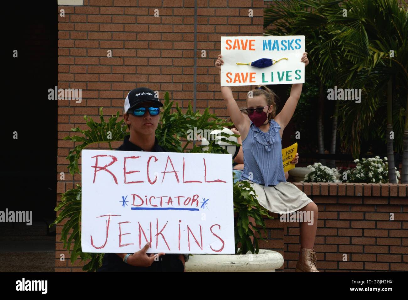 Viera. Brevard County. Florida. USA. September 9, 2021.Still not believing that Trump did not win the 2020 election a group of protesters assembled in front of the Brevard County School board building to burn face masks and wave flags. Other protesters in support of the board's decision for mandatory masks in the classroom assembled in the same area under the watchful eye of a Brevard County Sheriffs Deputy. Photo Credit: Julian Leek/Alamy Live News Stock Photo