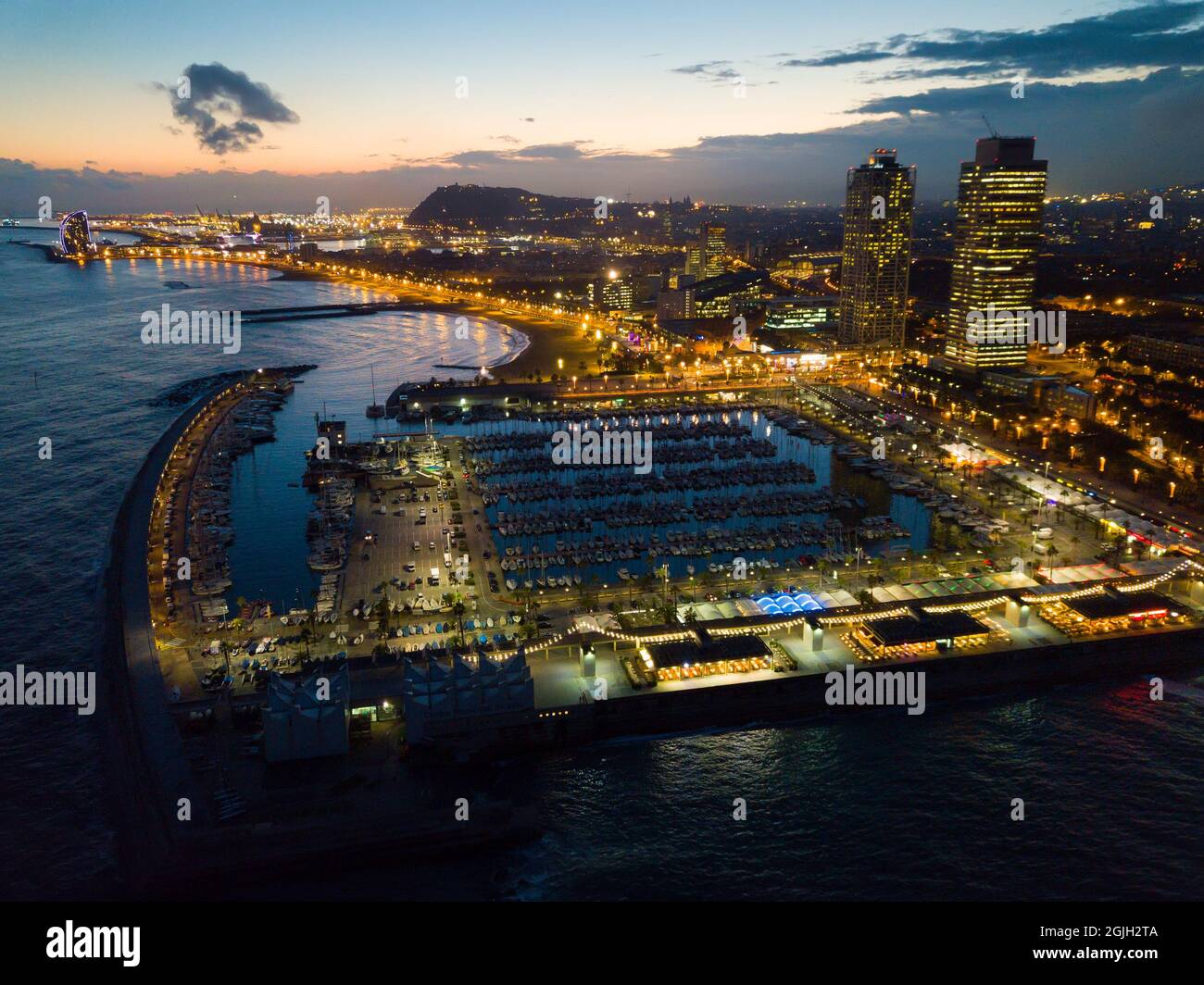 Aerial view in Barcelona city with coast and urban part of city at ...
