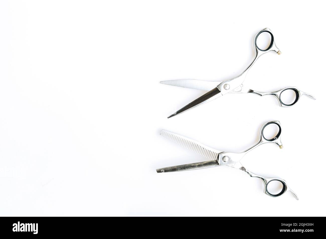 Professional barber's hair cutting tools set on white background Stock