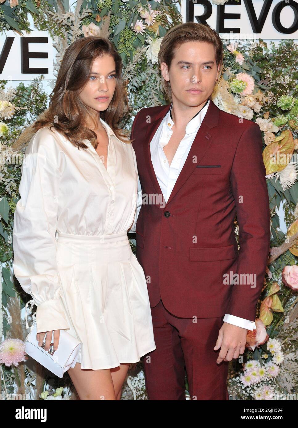 L-R: Barbara Palvin and Dylan Sprouse attend the Revolve Gallery fashion  experience opening at Revolve Gallery in New York, NY on September 9, 2021.  (Photo by Stephen Smith/SIPA USA) Credit: Sipa US/Alamy