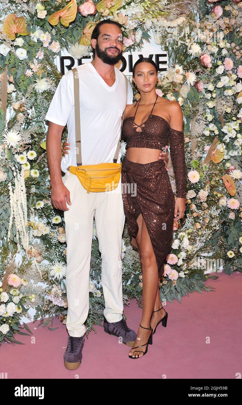 L-R: Joakim Noah and Lais Ribeiro attend the Revolve Gallery fashion  experience opening at Revolve Gallery in New York, NY on September 9, 2021.  (Photo by Stephen Smith/SIPA USA) Credit: Sipa US/Alamy