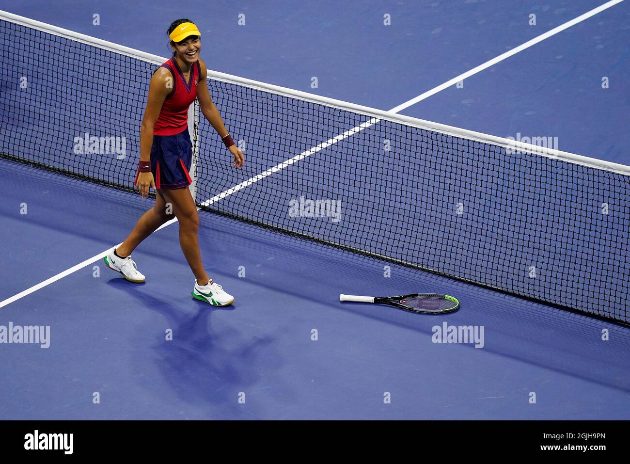 Emma Raducanu, of Great Britain, reacts after defeating Maria Sakkari, of Greece, during the semifinals of the US Open tennis championships, Thursday, Sept. 9, 2021, in New York.(AP Photo/Seth Wenig) Stock Photo