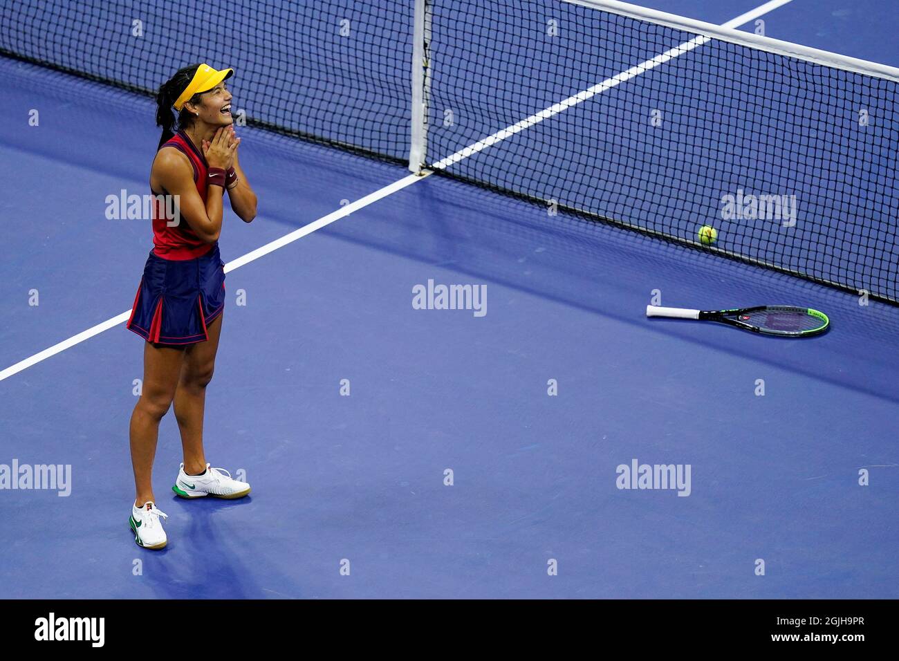 Emma Raducanu, of Great Britain, reacts after defeating Maria Sakkari, of Greece, during the semifinals of the US Open tennis championships, Thursday, Sept. 9, 2021, in New York. (AP Photo/Seth Wenig) Stock Photo