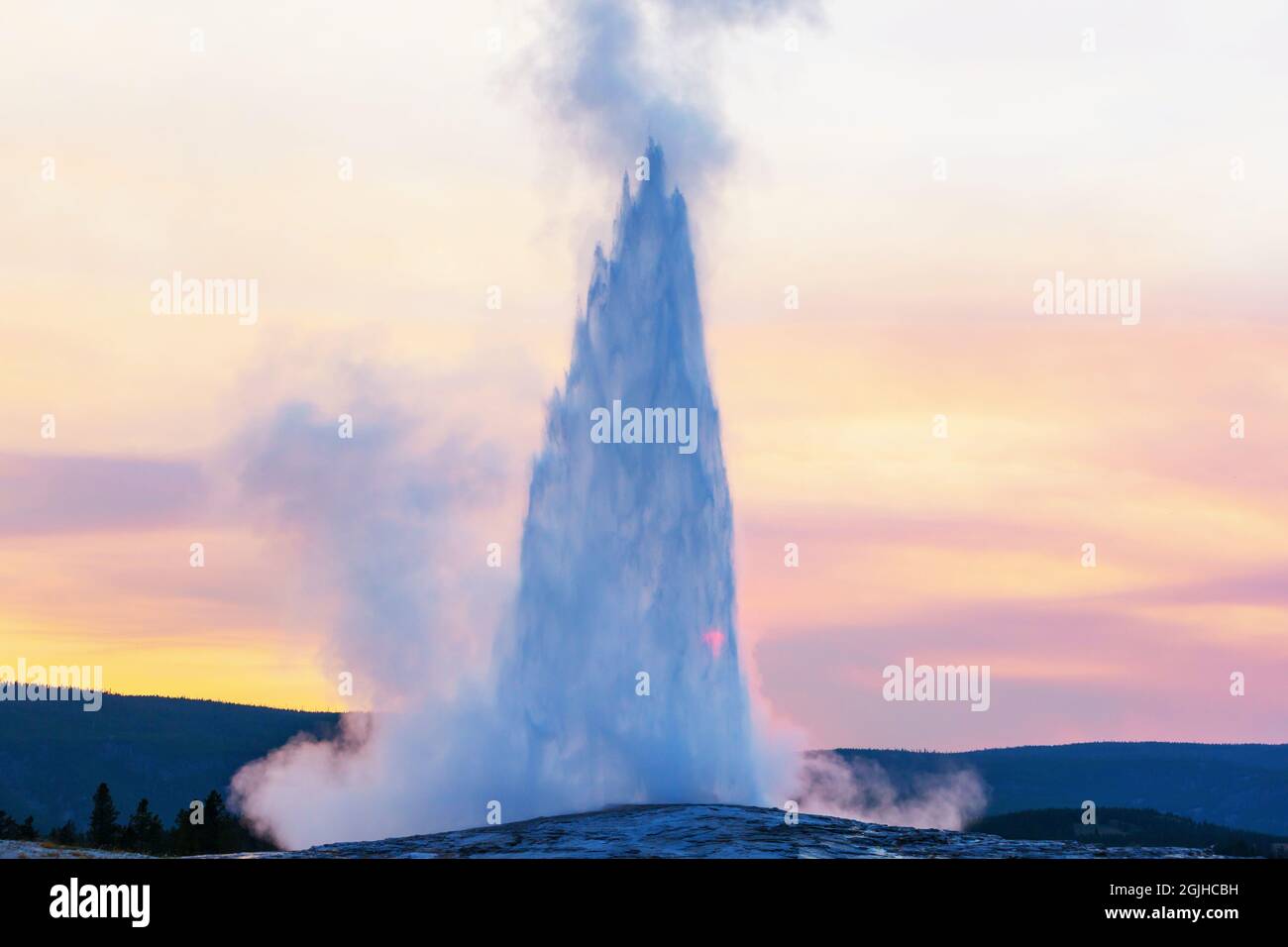 Old Faithful geyser eruption in Yellowstone National Park, USA Stock ...