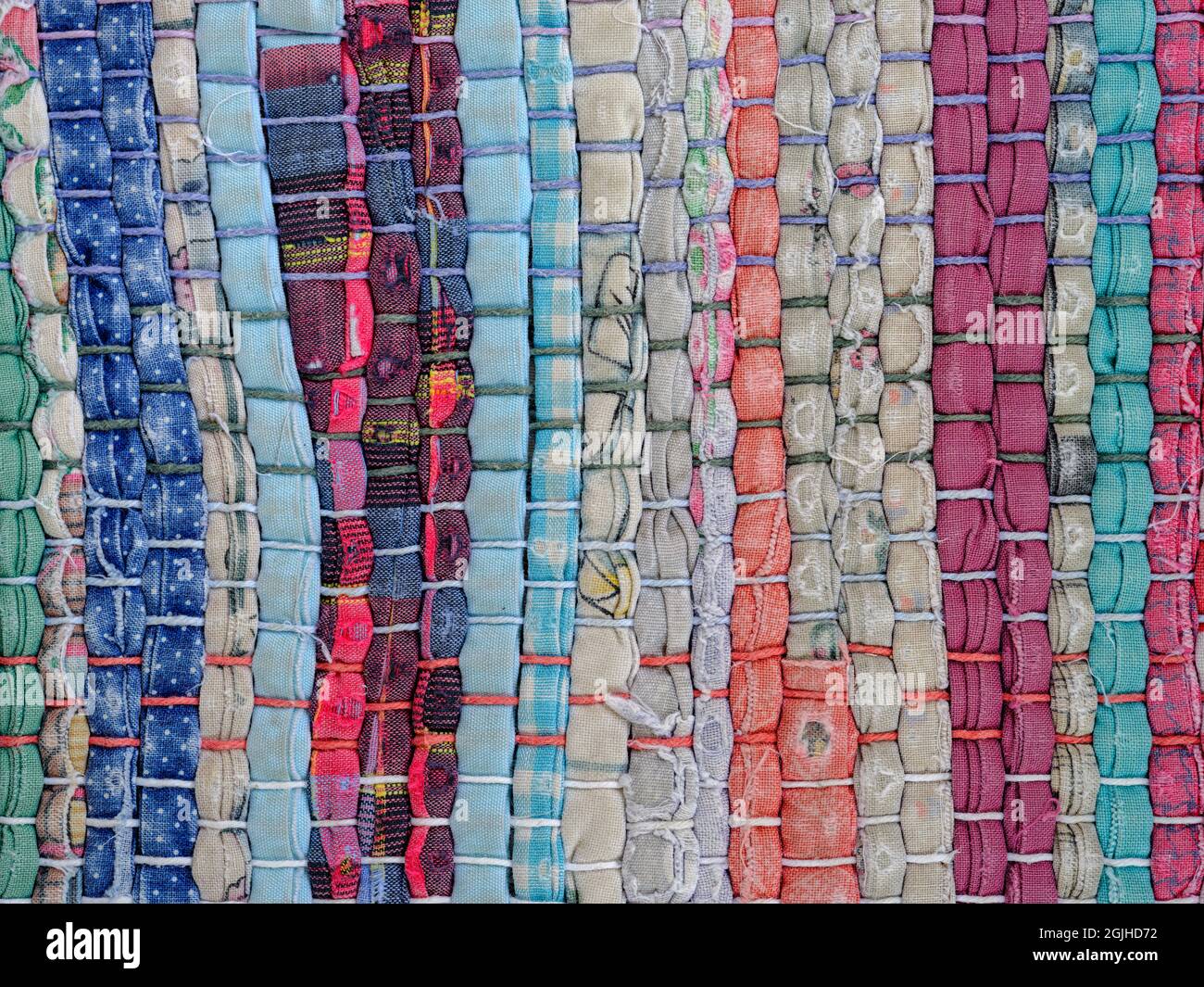 Close up detailed view of a hand made rag rug Stock Photo - Alamy