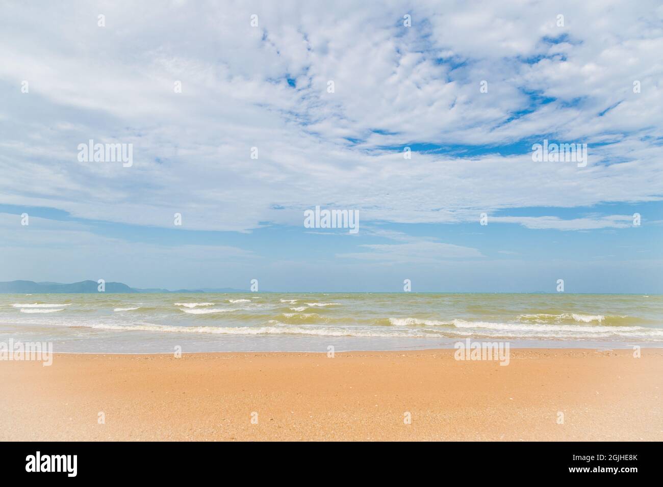 sand beach and blue sky background Stock Photo - Alamy