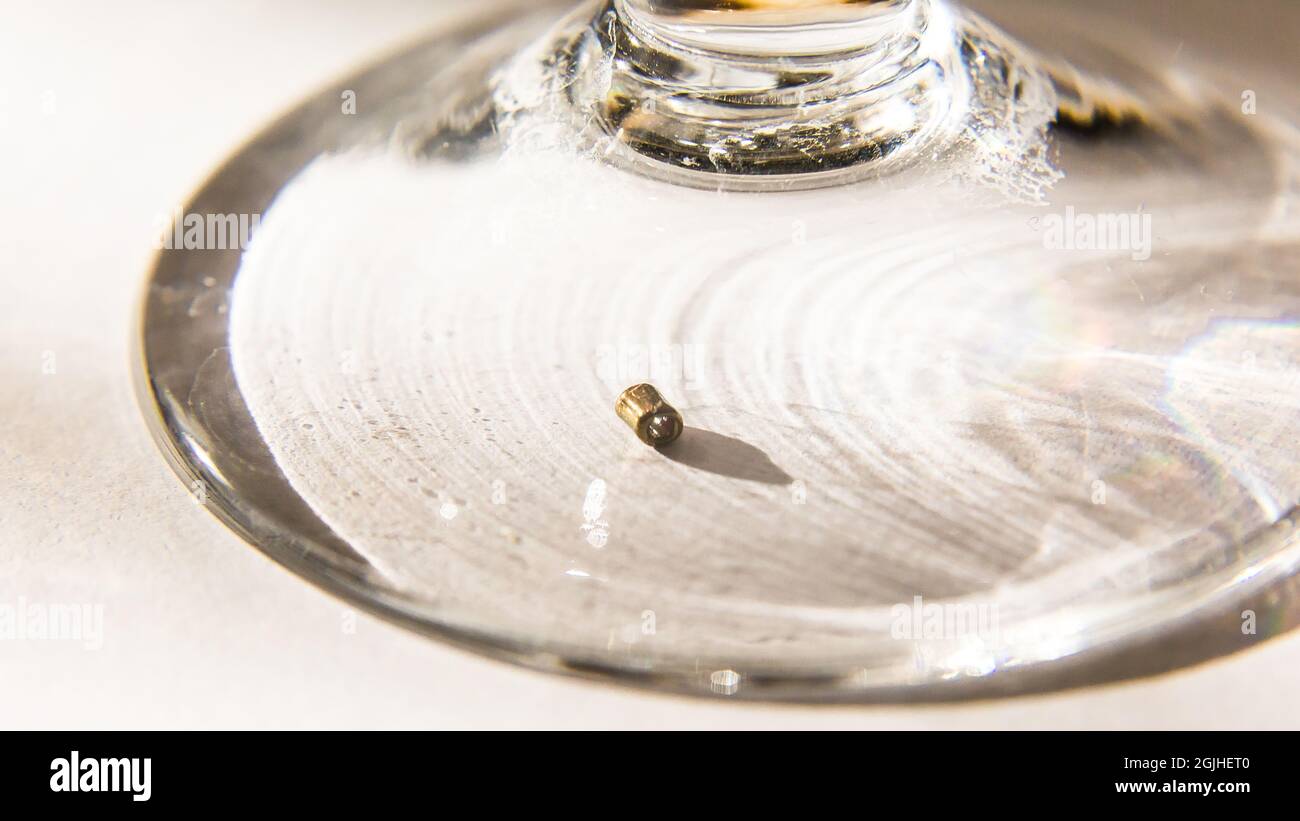 Macro shot of a metal ring on a glass surface Stock Photo
