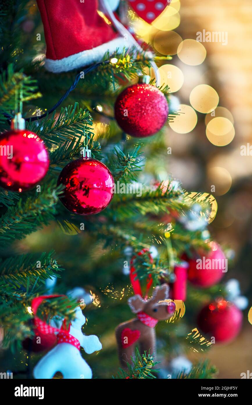 Its Christmas 2022 Pics 2022. Christmas Tree With Christmas Toys: Wooden Sleigh, Small Bird, Cones,  Balls, Colored Lights.concept: New Year, Christmas, Greeting Card, Celebra  Stock Photo - Alamy