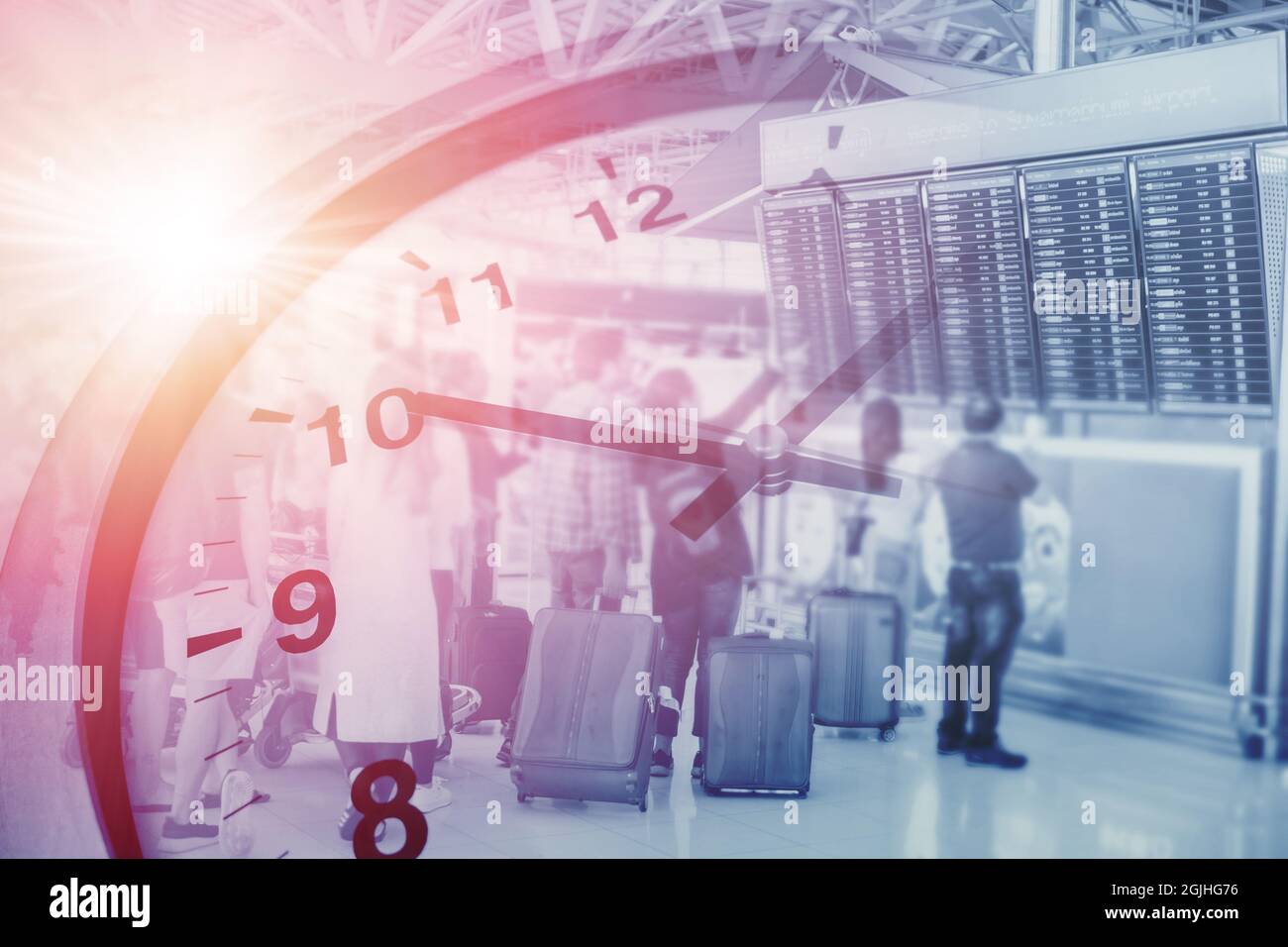 tourist in airport overlay with times clock blue color tone for Business travel countdown concept. Stock Photo