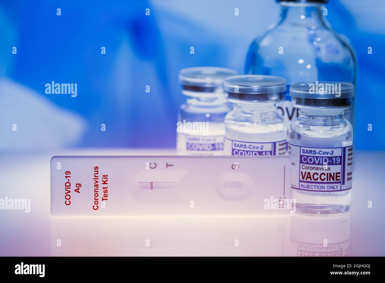 Covid-19 Self Rapid Antigen Test Kit with Covid Vaccine dose bottle for Coronavirus detect and treatment. Stock Photo