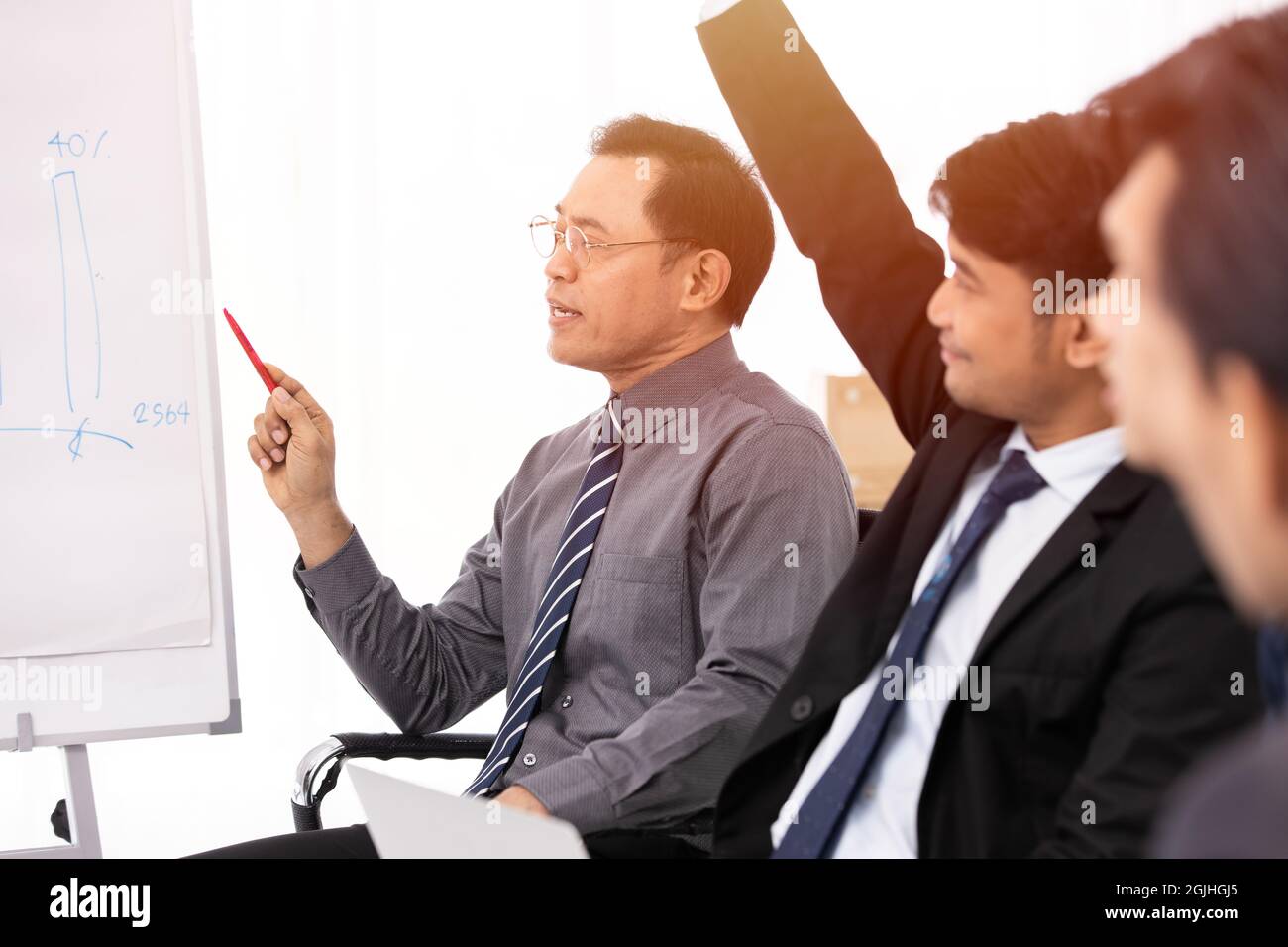 Business team leader meeting working group perform active present working with class action. Stock Photo