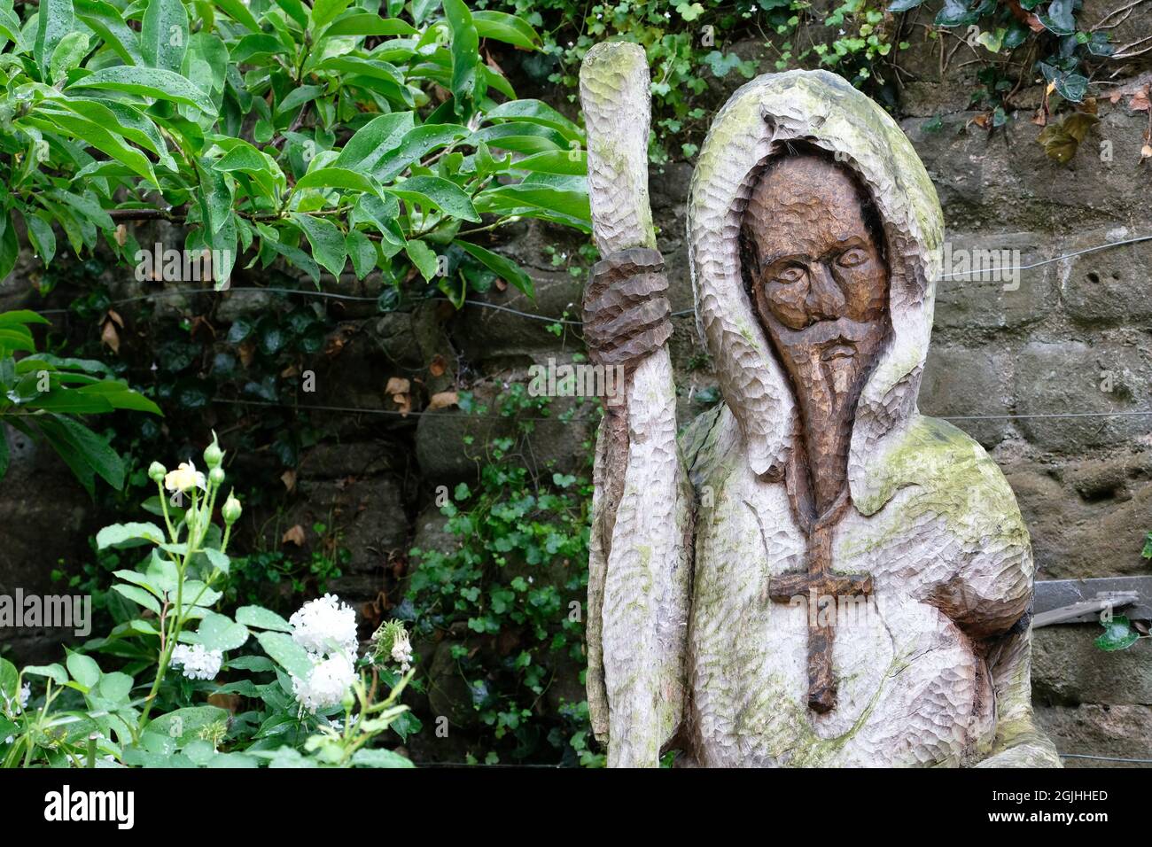 Carved wooden monk figure at Hereford Cathedral England UK Stock Photo