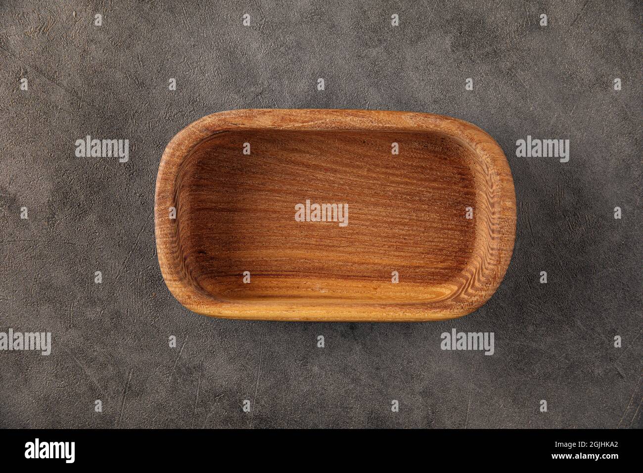 Oval brown empty natural wooden bowl Stock Photo