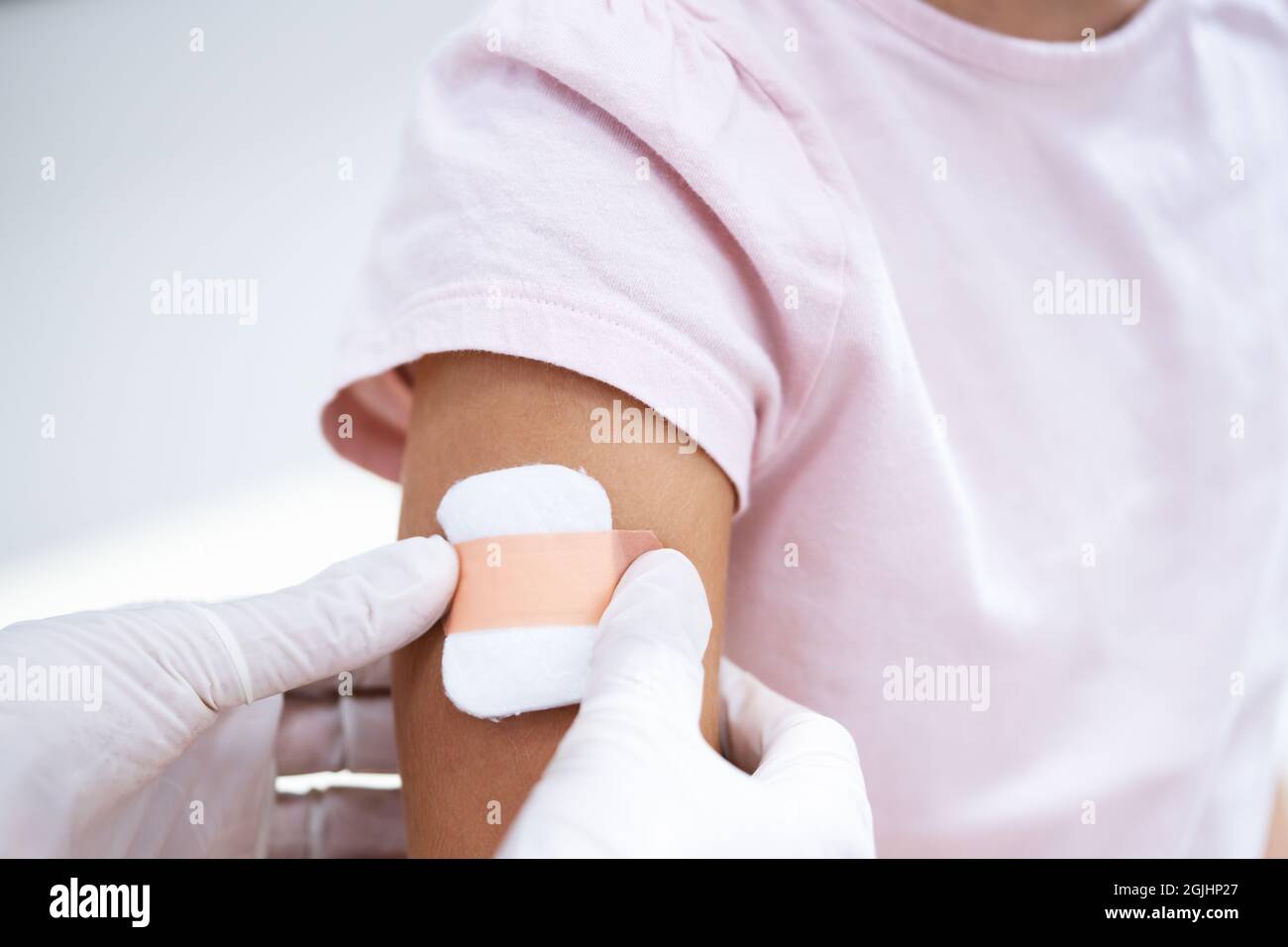 Kid Corona Virus Vaccine Injection. Covid-19 Child Immunization Stock Photo