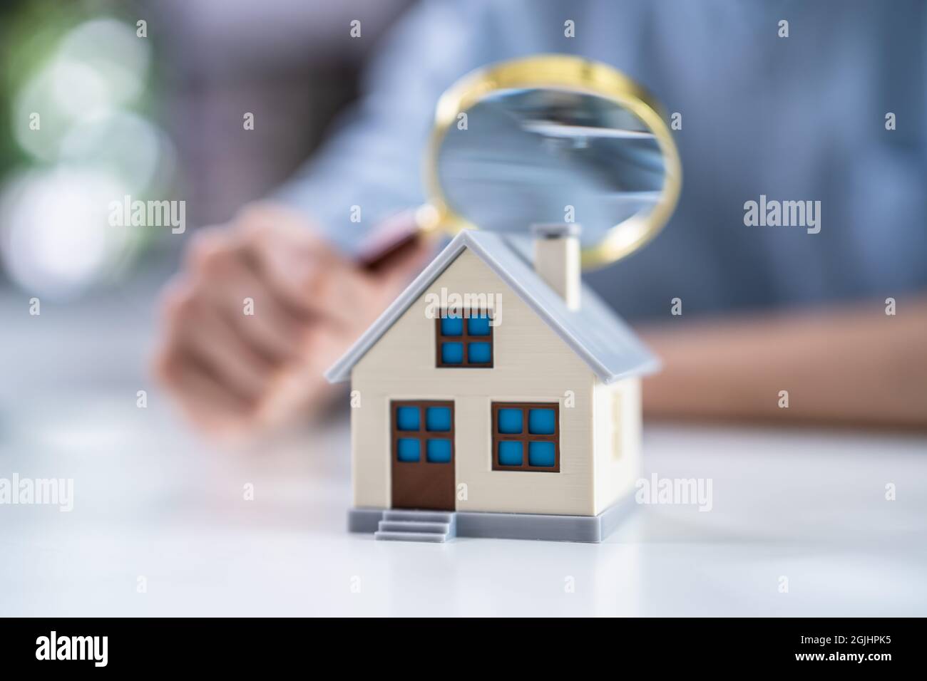 Real Estate House Inspection Before Purchase Using Magnifying Glass