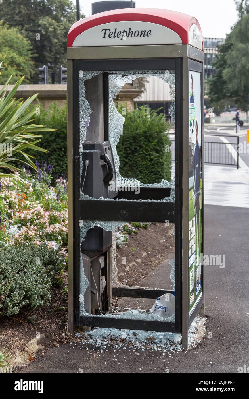 Vandalised Telephone Box in Newcastle UK Stock Photo