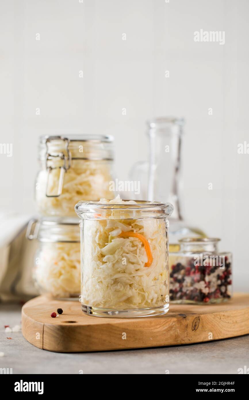Sauerkraut in glass jars. Fermentation and canning of vegetables Stock Photo Alamy