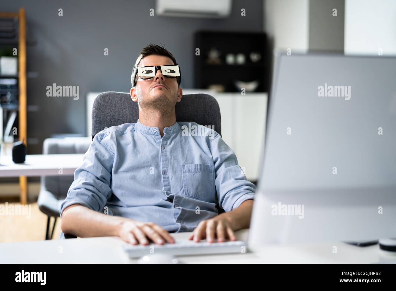 Tired Unhappy Businessperson Sleeping In Office. Bored Man Stock Photo ...