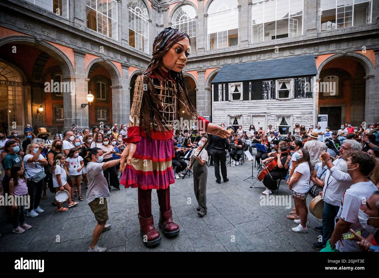 Little Amal, a giant puppet depicting a young Syrian refugee child