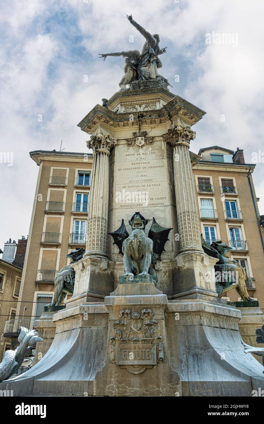 Fountain of the Three Orders, or fountain of the centenary, in the historic center of the city of Grenoble. Auvergne-Rhône-Alpes region, France Stock Photo