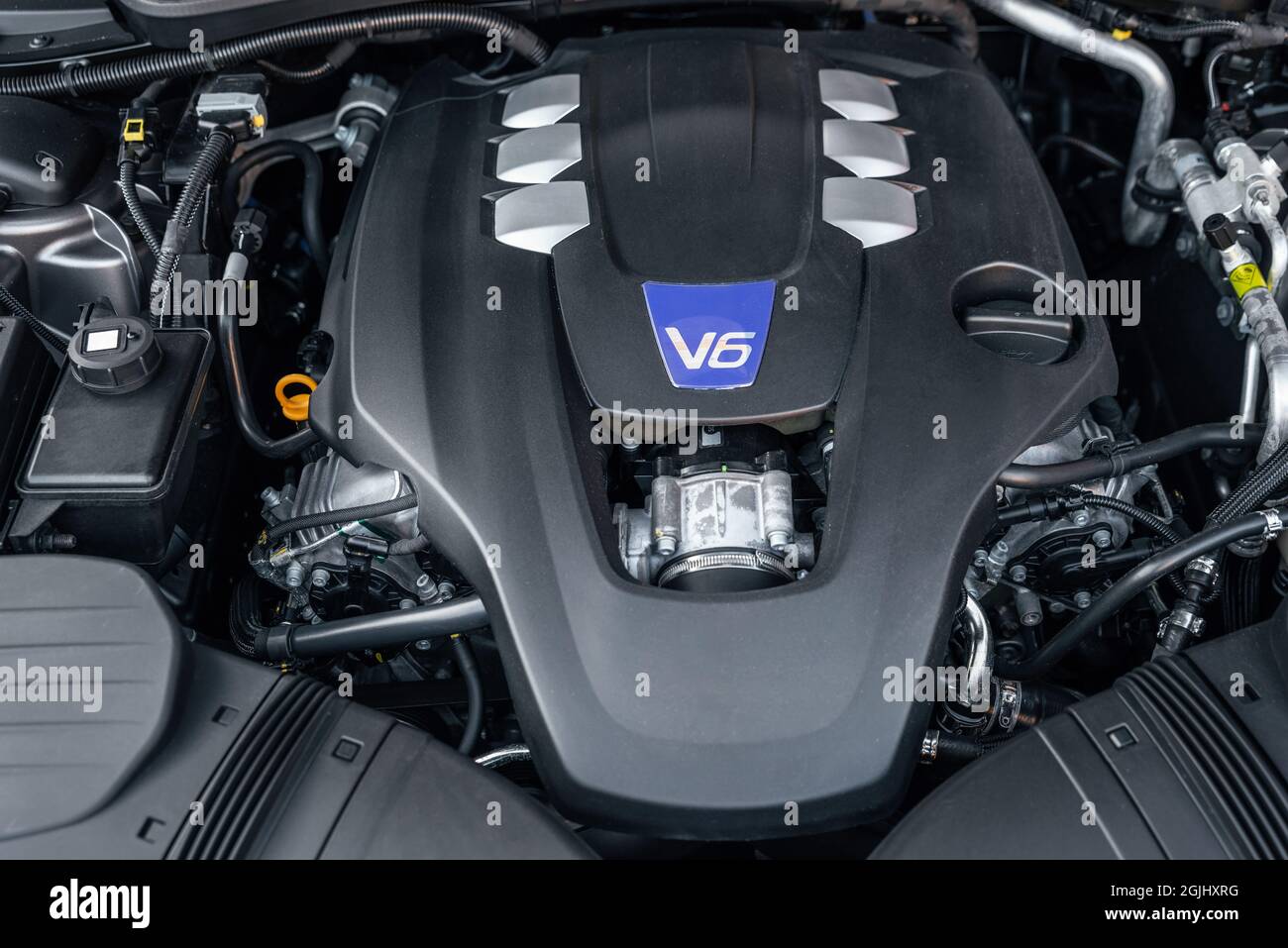 Close-up of the V6 engine of the modern luxury car, front view