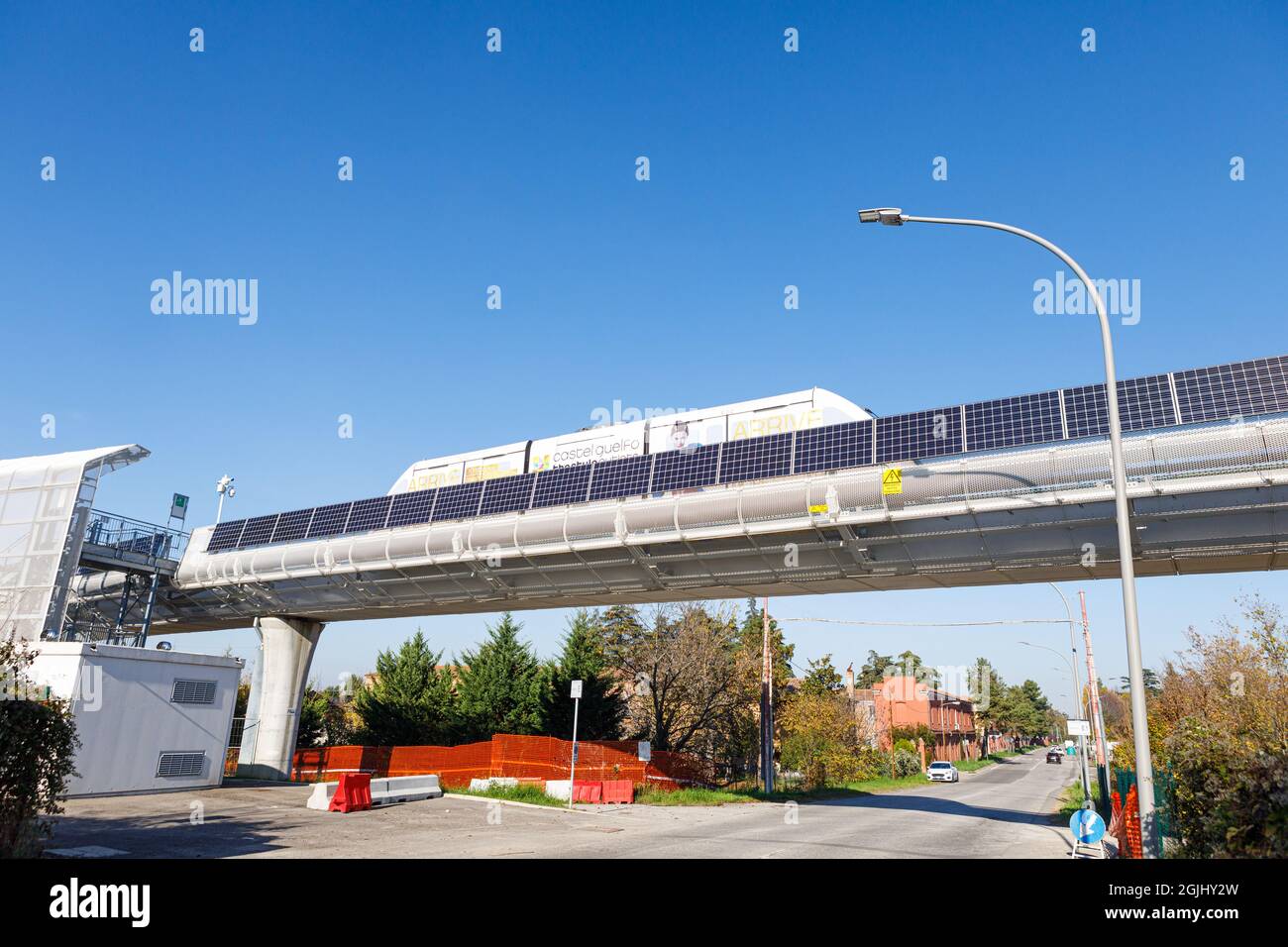 A public transportation system known as a People Mover moves above a