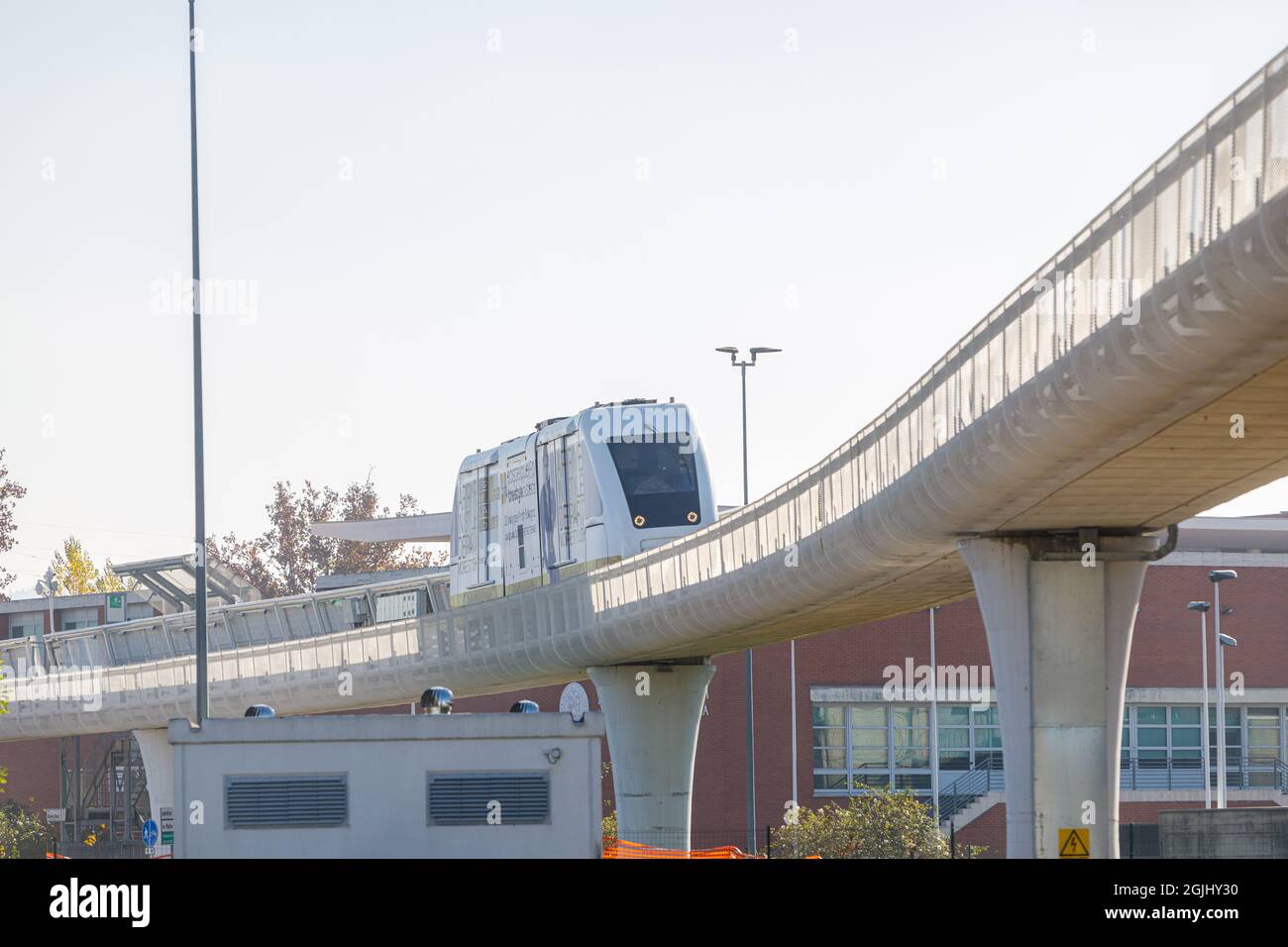 A public transportation system known as a People Mover moves above a