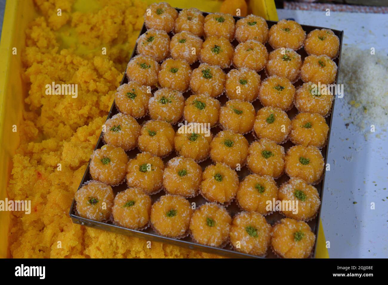 Motichur Ladoos are special type of sweet offered to the elephant-headed God, Lord Ganesha as bhog. Ganesh Chaturthi, one of the most auspicious festivals in the Hindu calendar, marks the beginning of the 10-day festivities. Also known as Vinayaka Chaturthi, the celebrations begin with bringing home an idol of Lord Ganesha. Food forms an important part of Ganesh Chaturthi celebrations. Among the many desserts to fruits that are part of the festivities, modaks and ladoo. (Photo by Sukhomoy Sen/Pacific Press) Stock Photo