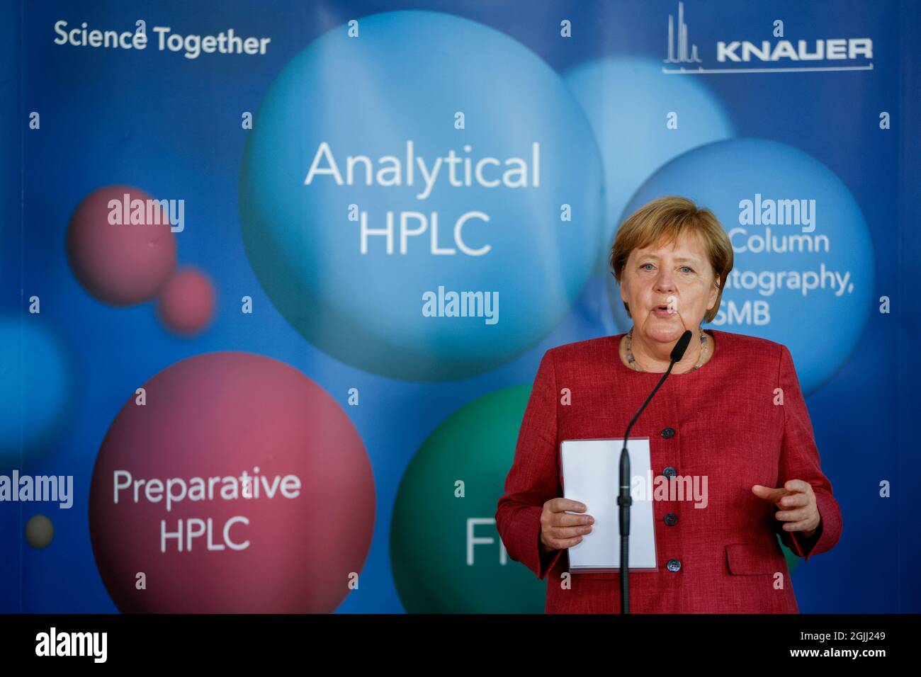 Berlin, Germany. 10th Sep, 2021. German Chancellor Angela Merkel (CDU) speaks after her visit to the company Knauer Wissenschaftliche Geräte GmbH. Credit: Odd Andersen/AFP Pool/dpa/Alamy Live News Stock Photo