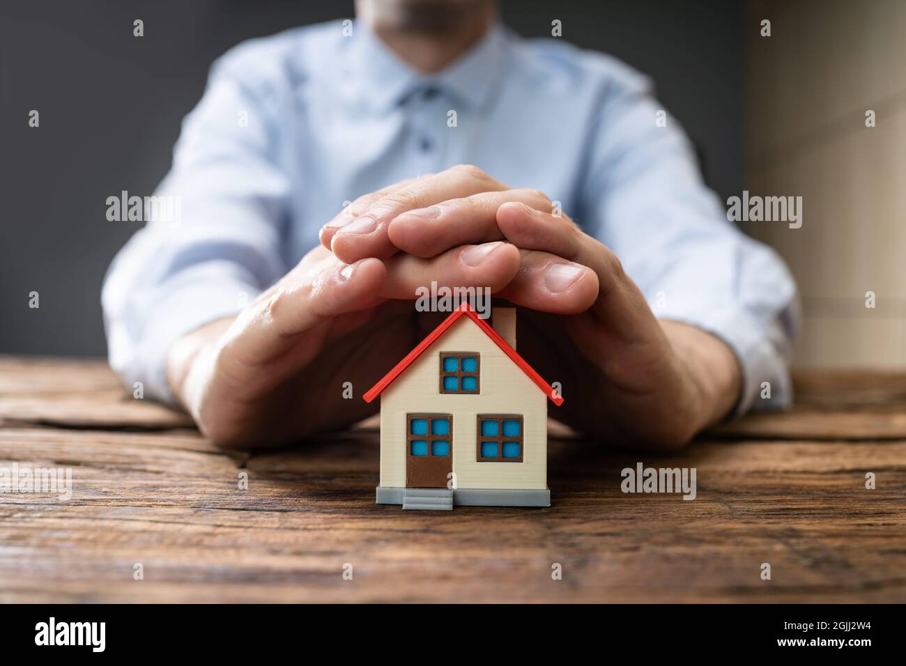 House Property Insurance Cover And Mortgage Security Stock Photo